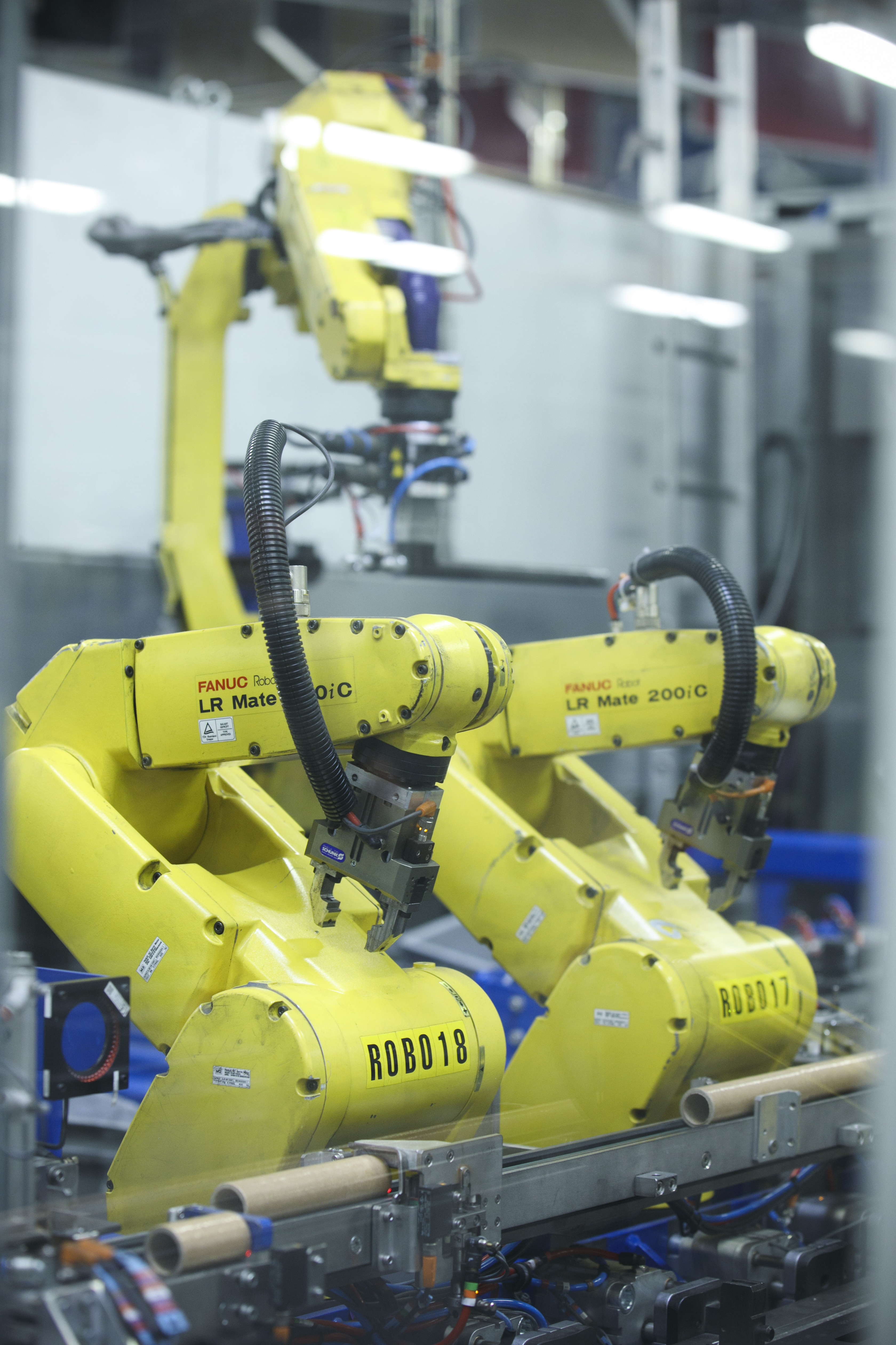 Robots on ribbons slitting machine