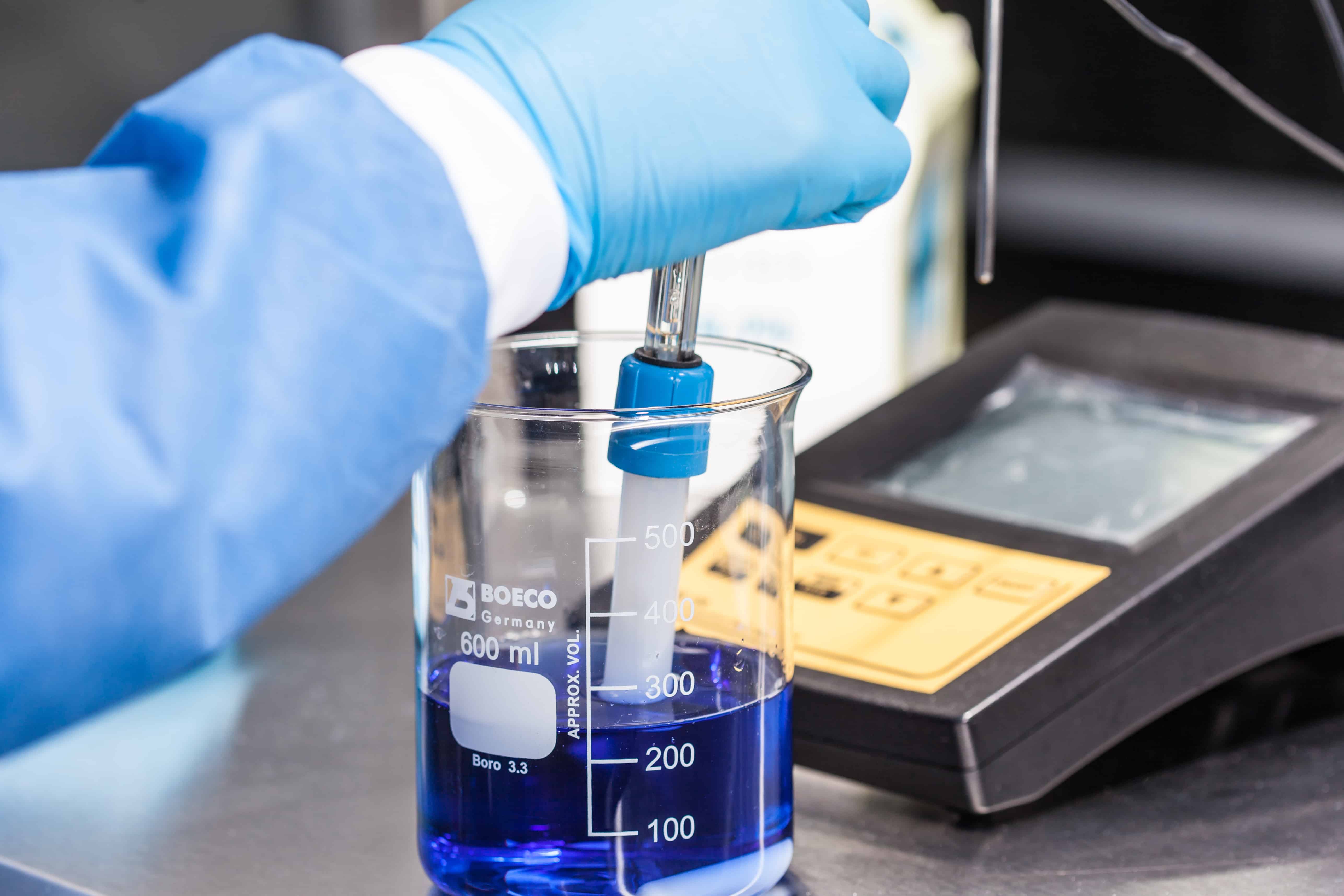 scientist using a ph meter at laboratory