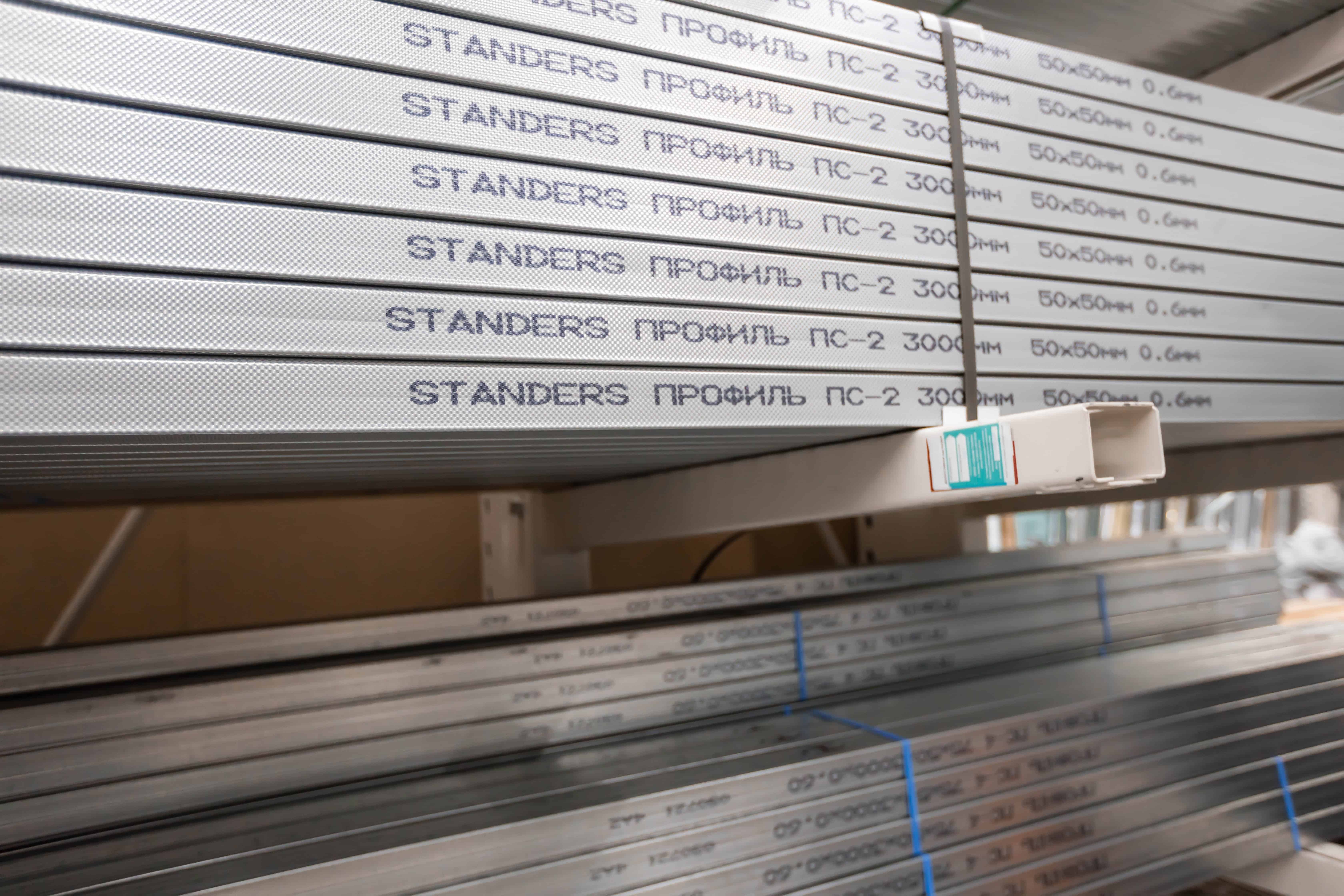 stack of galvanized rectangular steel pipes for building materials. production and construction of drywall walls. the concept of the construction.